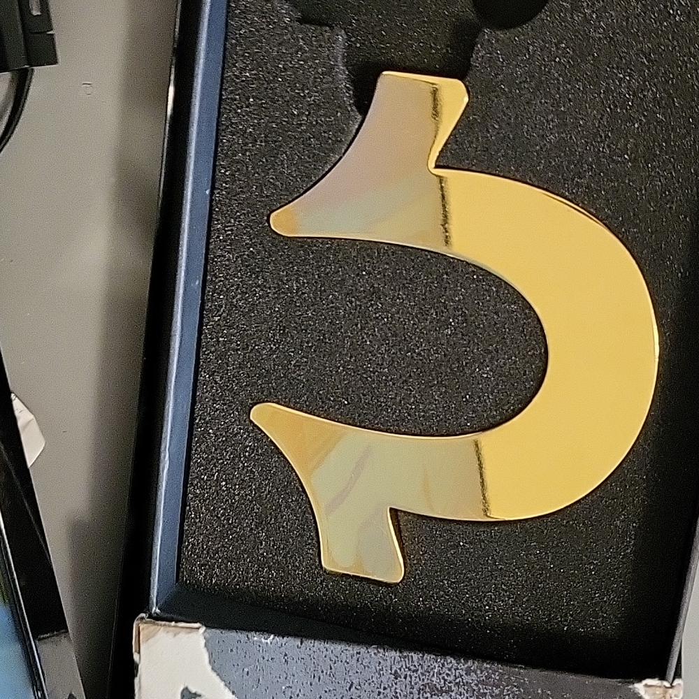 True Religion paperweight